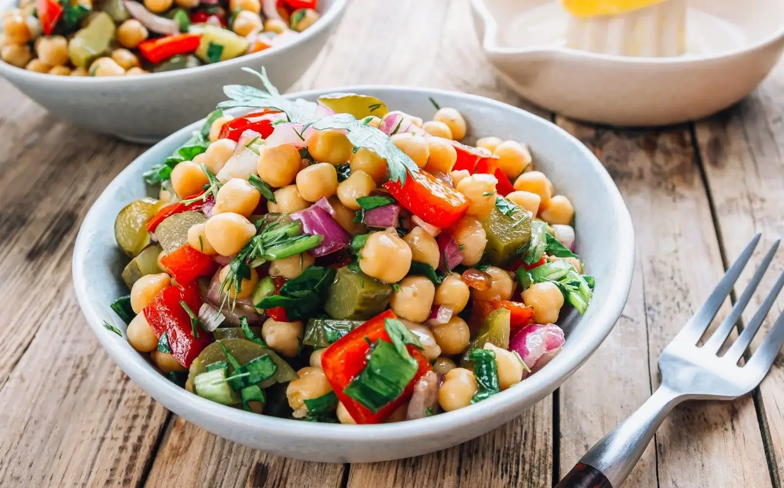Chickpea salads and stews served in ceramic bowl