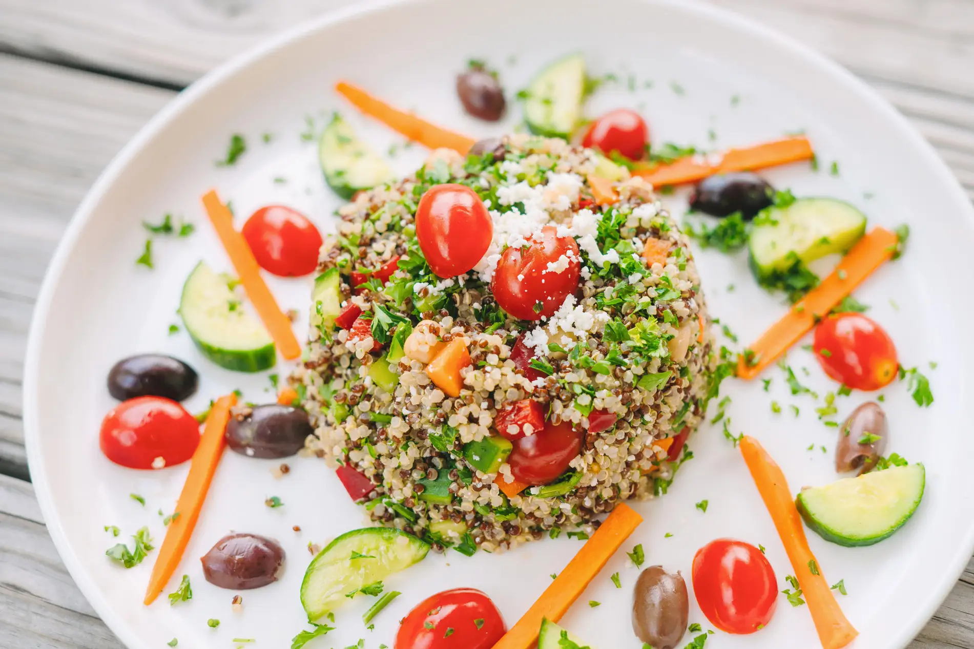 a close up of quinoa salad food on a table