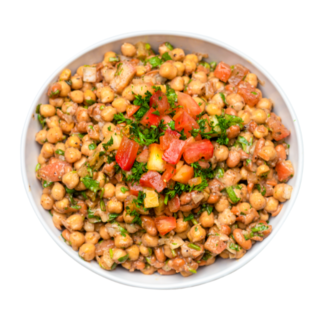 Chickpea Slad with tomatoes and onions in a white bowl