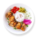 Classic chicken kabob skewer from Aladdin Mediterranean cuisine, served with fragrant rice, grilled vegetables, and garlic sauce