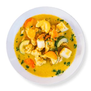 Curry chicken plate from Aladdin Mediterranean Cuisine—chicken breast in creamy turmeric-ginger curry with potatoes, carrots, and cranberry-almond rice