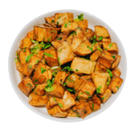 Lemon Cilantro Roasted Potatoes in a white bowl