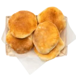 Pita Bread, a classic Mediterranean staple served warm at Aladdin Mediterranean Cuisine in Houston