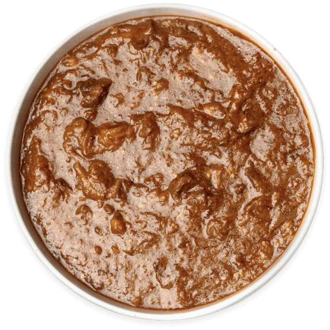 Pomegranate Eggplant stew in a white bowl