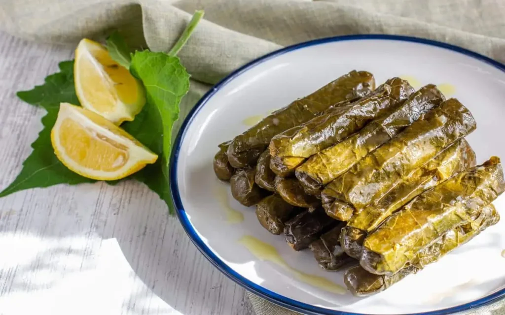 Freshly prepared dolmas at Aladdin Mediterranean Cuisine in Houston, served with lemon wedges
