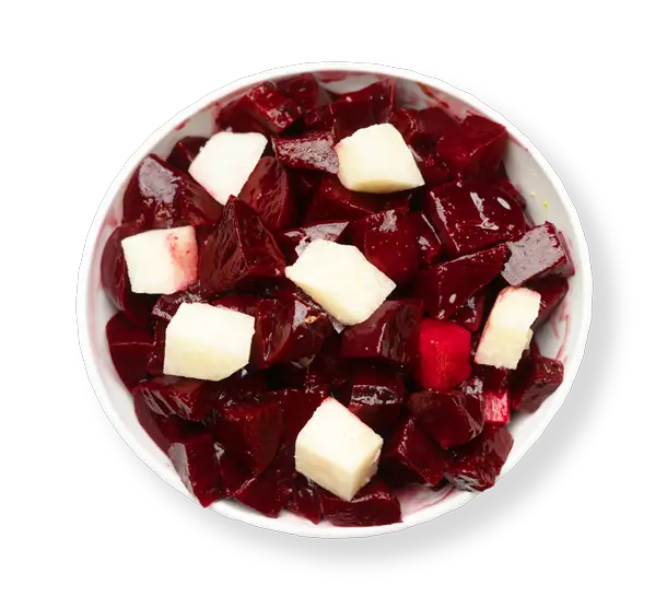 Overhead view of Aladdin Houston’s Beets and Jicama Salad—vibrant ruby-red beet chunks mixed with crisp white jicama cubes in a white bowl