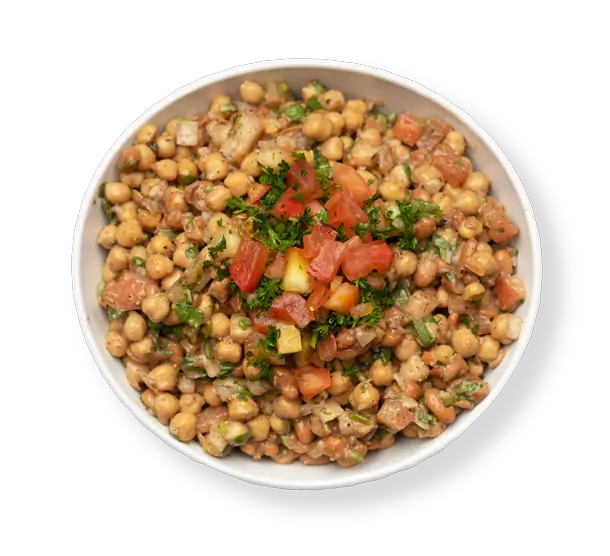 Chickpea Salad with tomatoes, parsley, and olive oil from Aladdin Mediterranean Cuisine in Houston — fresh Mediterranean side dish.