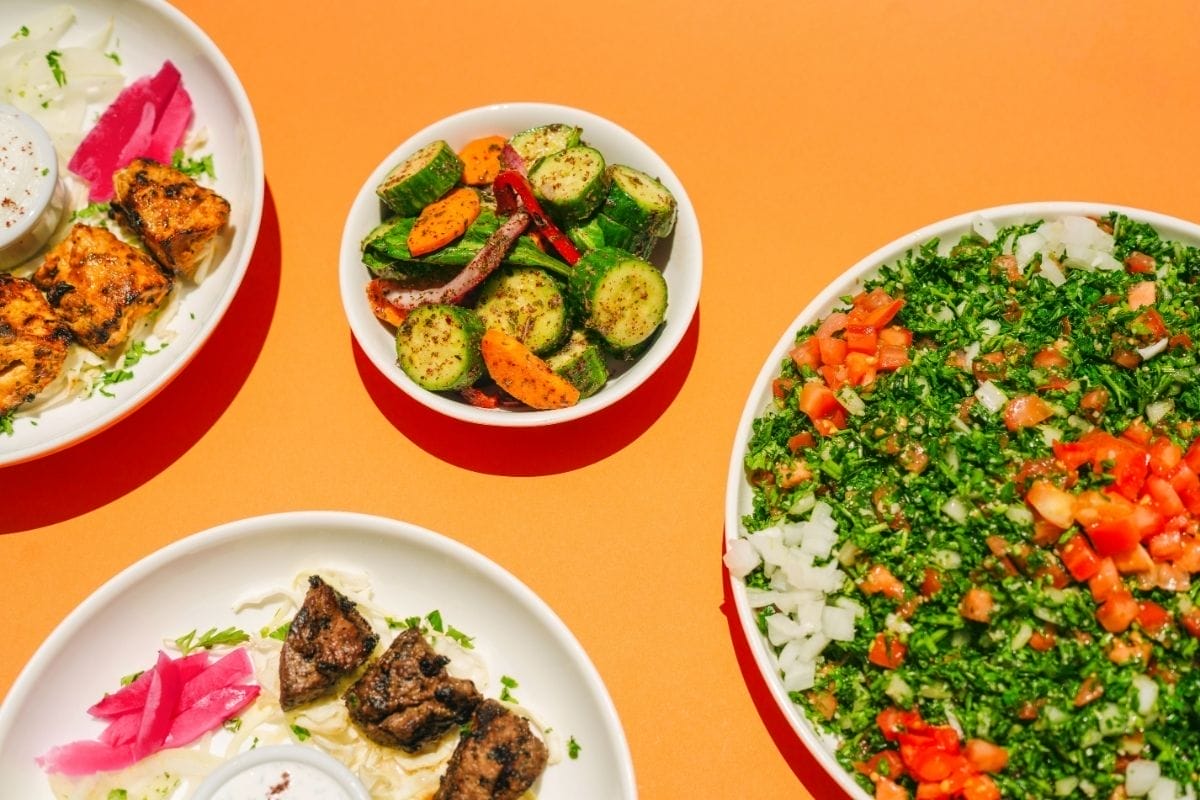 Fresh halal food restaurant in Houston serving kabobs, falafel, hummus, and Mediterranean dishes at Aladdin Montrose & Garden Oaks.