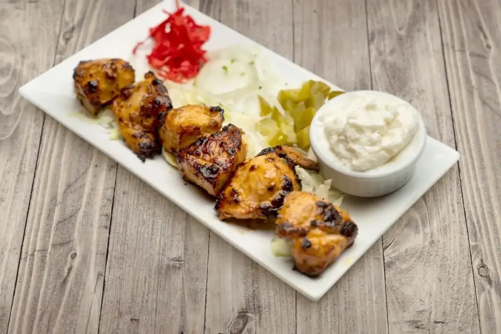 Grilled chicken kabob plate at Aladdin Mediterranean Houston perfect if you are looking for healthy lunch ideas.